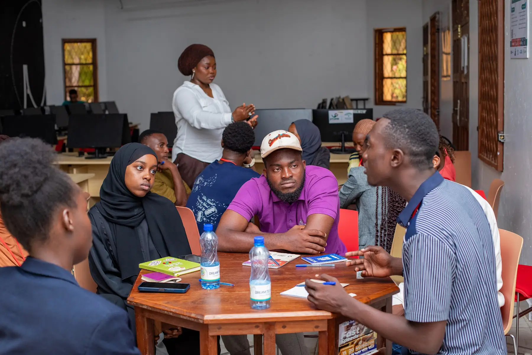 A small group working around a table