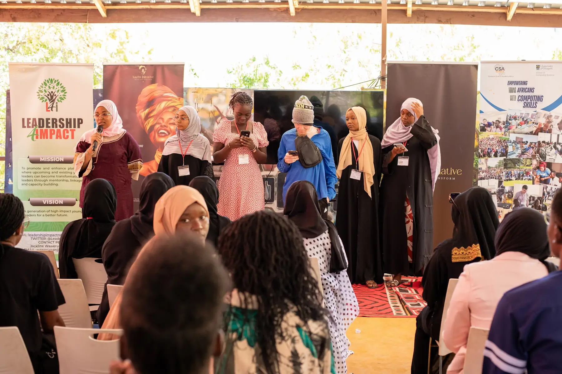 Participants on their feet during a session